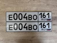 Фото автомобильного номера Е004ВО 161